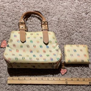 Dooney & Bourke small bag w/matching wallet.